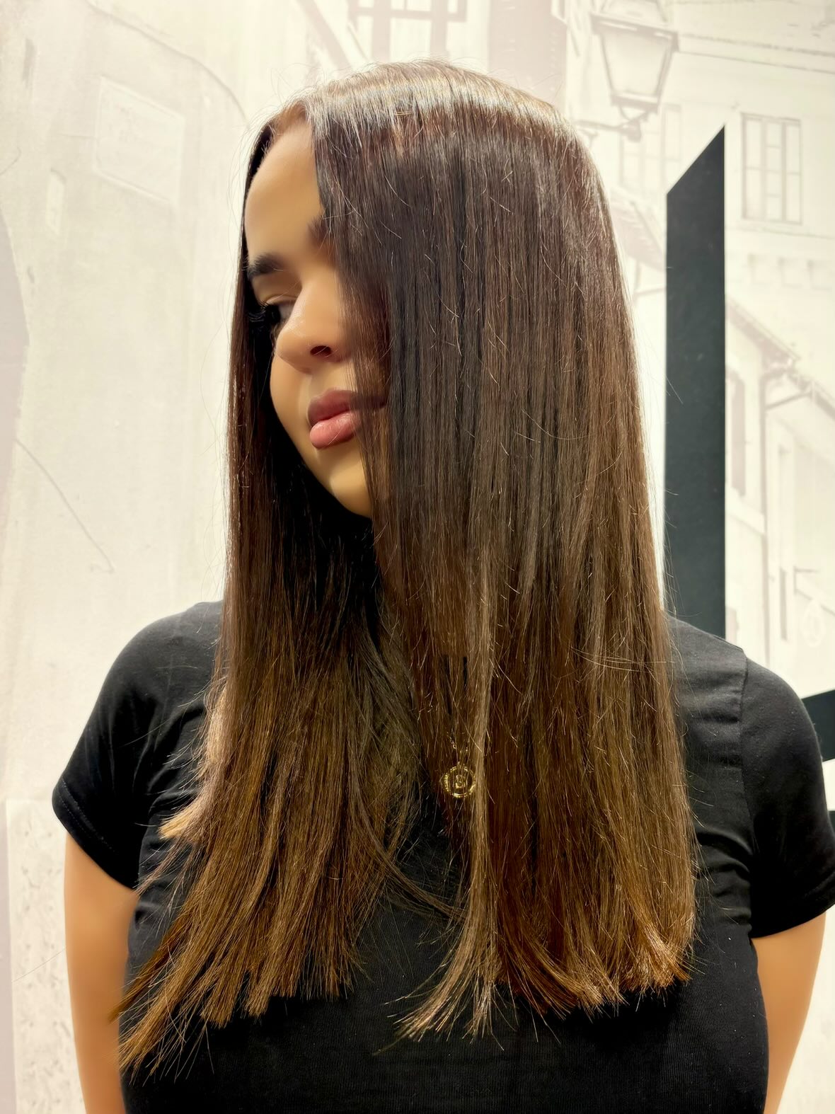 Dark hair with seamless nano extensions.